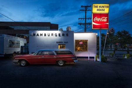 Hunter House Hamburgers was born in 1952 featuring sliders, little hamburgers with juicy, sweet onions smashed into the meat and the buns steamed hot. This icon of Americana is going to be demolished and replaced with a new high rise building. As I was driving on Woodward Avenue, I was attracted by this retro architecture. I pulled into the parking lot. At the same time I had the good fortune of being there when a 1950's station wagon arrived and parked in just the right spot. Love this little piece of history, and I'm a vegetarian.